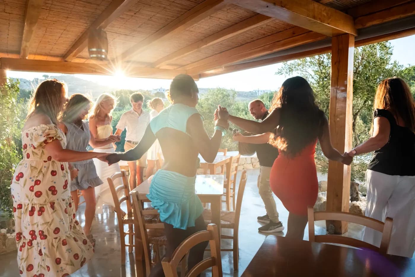 Guests dancing traditional Greek dances at Tour in Mykonian Land